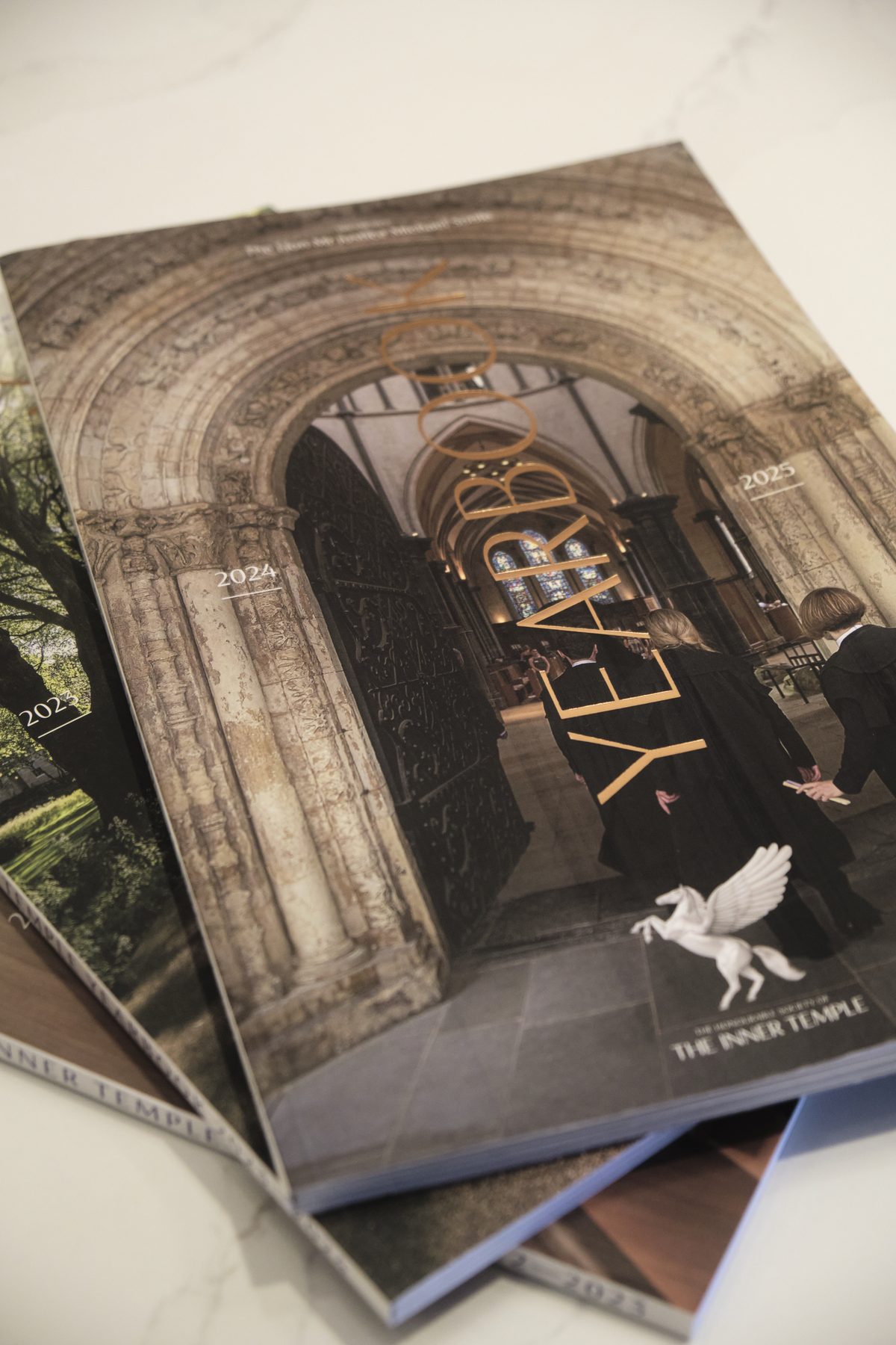 A stack of recent Inner Temple Yearbooks, with the 2025 edition on top