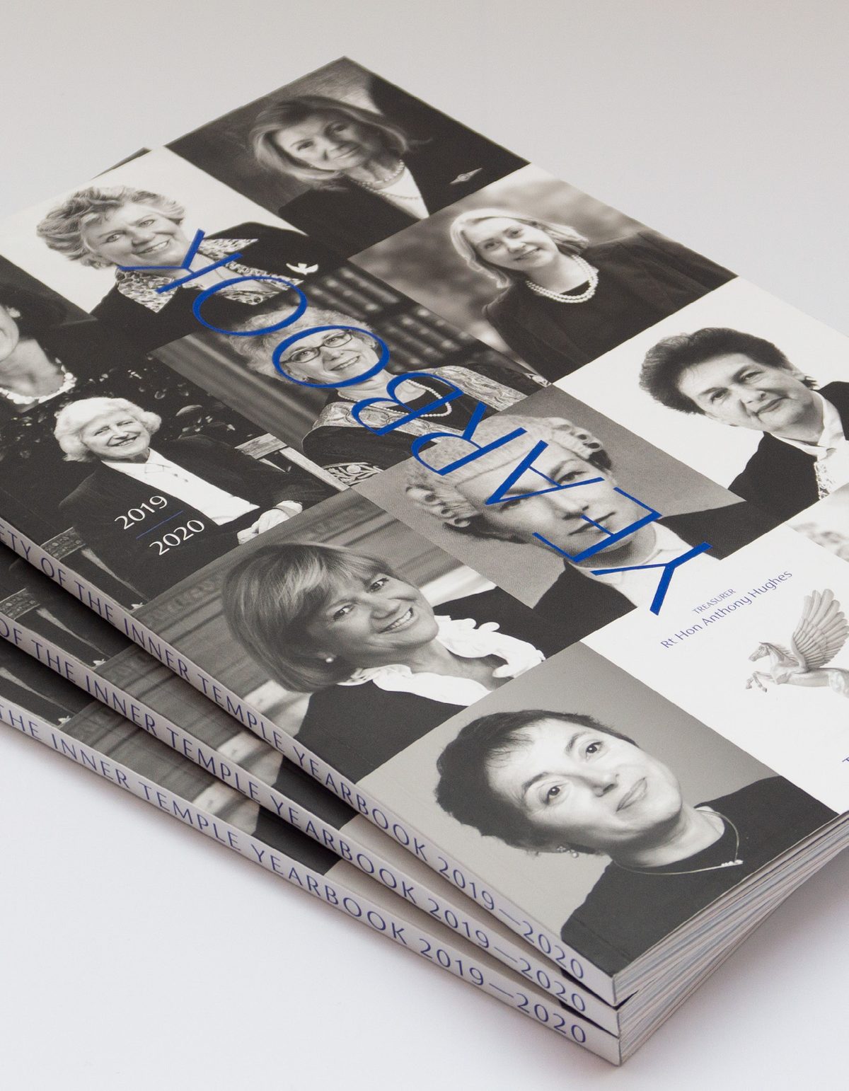 A stack of Inner Temple Yearbooks with black and white portrait covers
